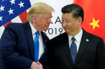 FILE PHOTO: Trump meets Xi at the G20 leaders summit in Osaka, Japan