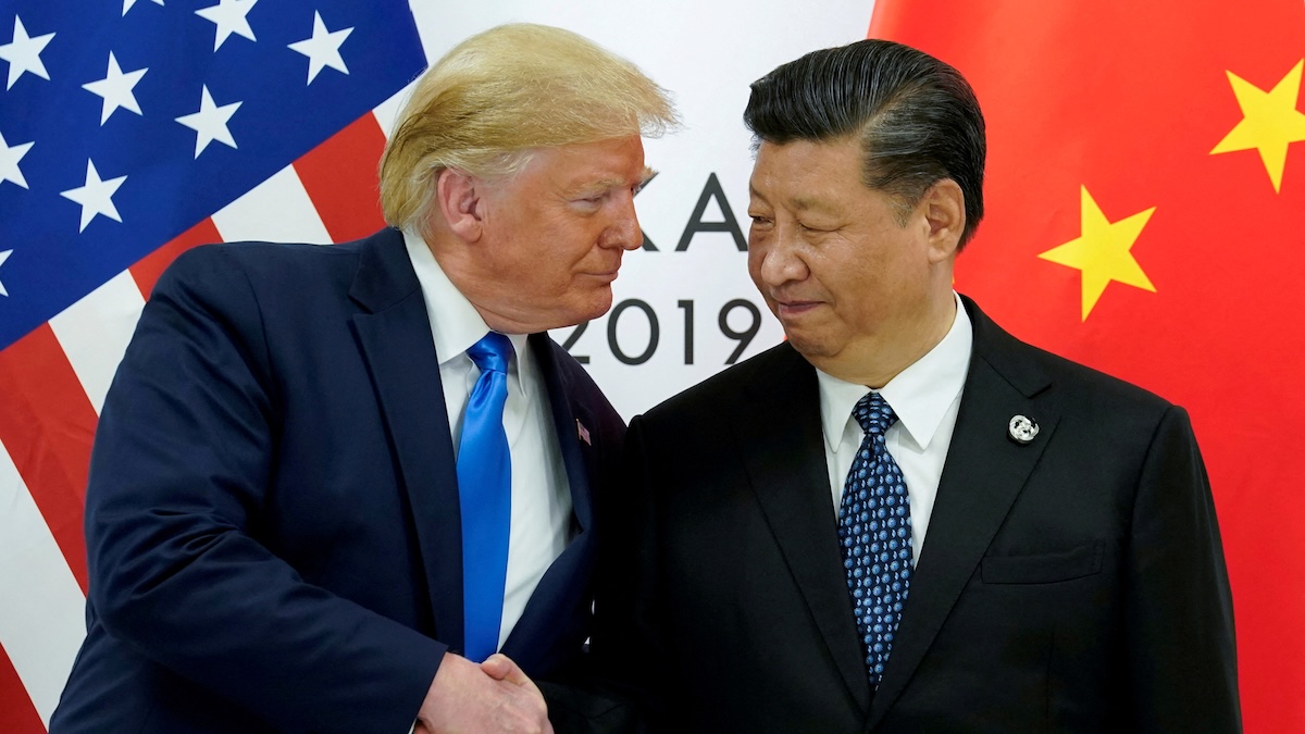 FILE PHOTO: Trump meets Xi at the G20 leaders summit in Osaka, Japan