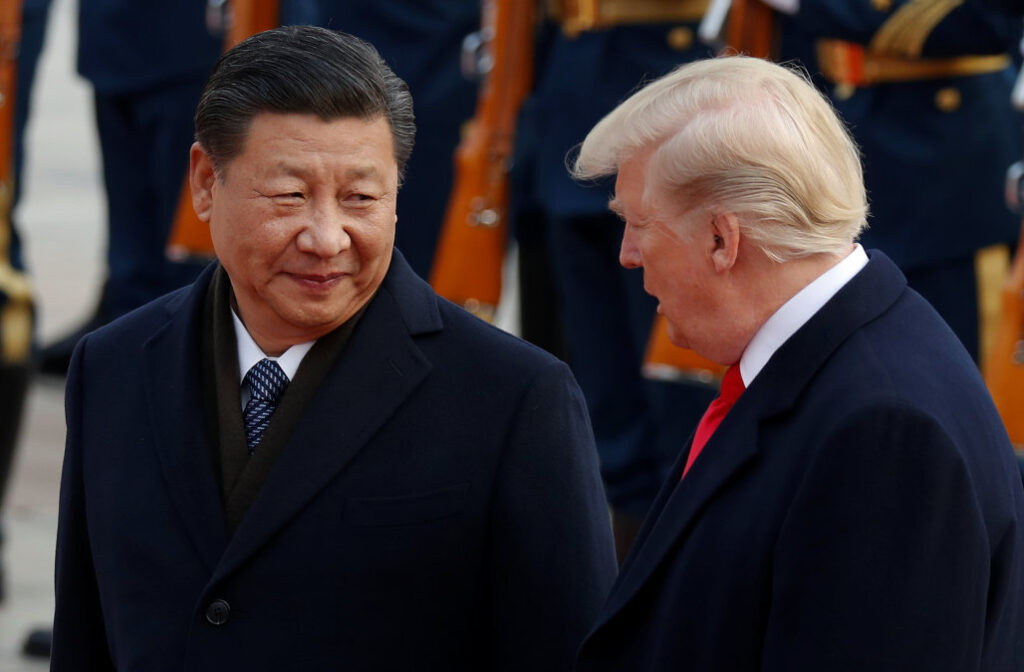U.S. President Donald Trump takes part in a welcoming ceremony with China's President Xi Jinping at the Great Hall of the People in Beijing